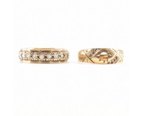 Two gold rings with missing stones. The first being a hallmarked 18ct gold dome ring with etched detailing &amp; stones missi