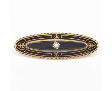 A 19th Century 15ct gold enamel and pearl mourning locket brooch pin. The pin set with a central pearl&nbsp; framed by enamel