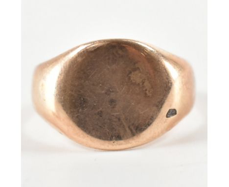 A hallmarked 9ct rose gold signet ring. The ring having a rounded head to tapering shank. Hallmarked for Birmingham 1916, mak