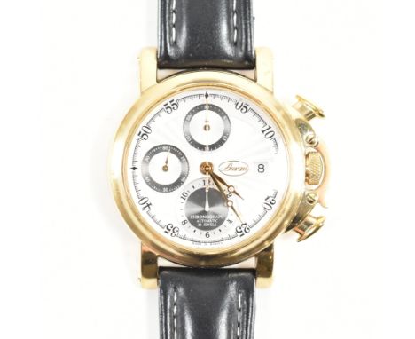 A Buran limited edition gold tone wrist watch. The watch having a textured silvered dial with three subsidiary dials, date ap