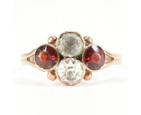 A 19th Century Victorian 9ct gold, white and red paste stone ring. The ring being set with two white paste stones and two rou