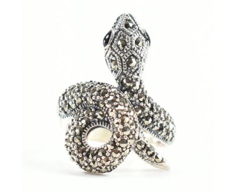 A 925 silver &amp; marcasite snake ring. The ring of wrap around form depicting a coiled snake, set throughout the head with 