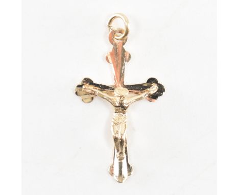 A vintage 9ct yellow gold crucifix necklace pendant. The pendant depicting Jesus being crucified, the cross being decorated i