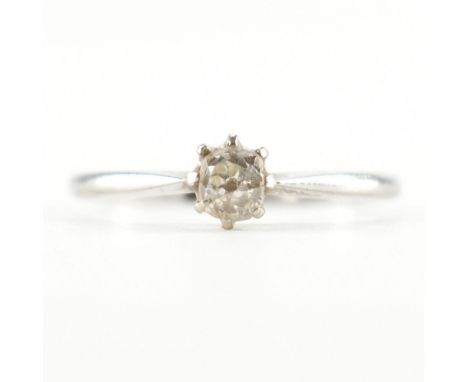 An 18ct white gold &amp; diamond solitaire ring. The single stone engagement style ring having a central old cut diamond in a