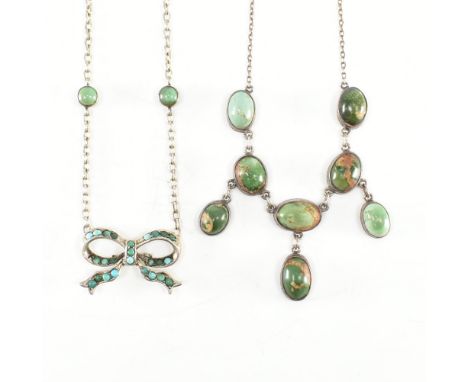 Two silver &amp; stone set necklace chains. The first having a bow ribbon style pendant set throughout with green &amp; blue 