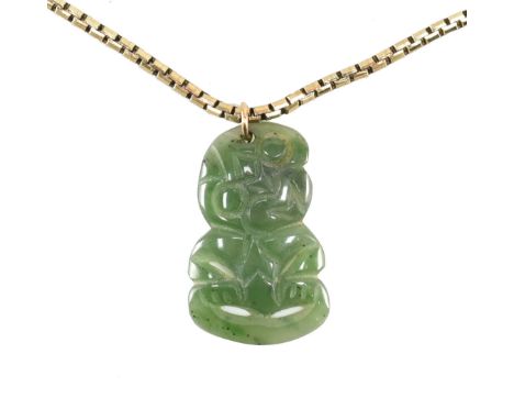 A hallmarked 9ct yellow gold snake chain &amp; nephrite jade&nbsp; Hei Tiki pendant. The chain comprised of rounded snake box