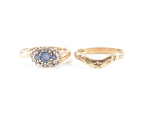 Two hallmarked 9ct yellow gold rings. The first ring having a central oval cut blue stone to the centre flanked by a round cu