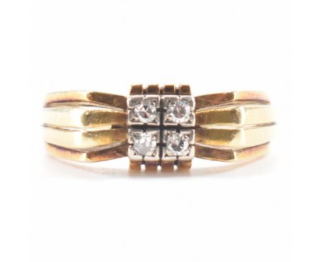 A vintage yellow gold &amp; diamond cluster ring. The ring having four round cut diamonds in square settings forming a square