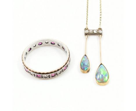 A 1920s negligee opal and diamond negligee pendant and later 9ct eternity ring. &nbsp;The negligee strung with two graduating