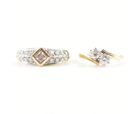 Two 14ct gold and cz dress rings. The lot to include a two stone crossover ring (hallmarked London, size K), and a ring set w