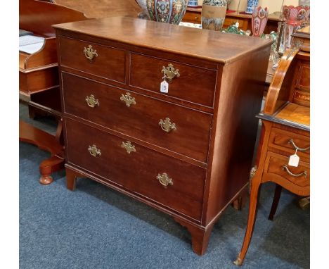 A George III oak chest of two short over two long drawers with brass handles, on bracket feet, 92cm