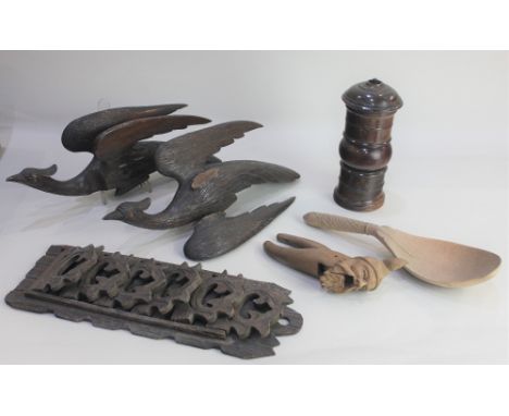 A turned wood spice mill possibly laburnum, 17cm a pair of carved wood exotic bird mounts (one wing off but present) 34cm a p