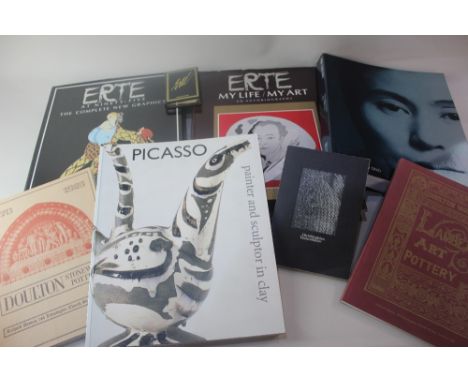 Two Erte books signed by the artist; Erte Pictures in Praise of Beauty, and The Art of Erte, together with two hardback volum