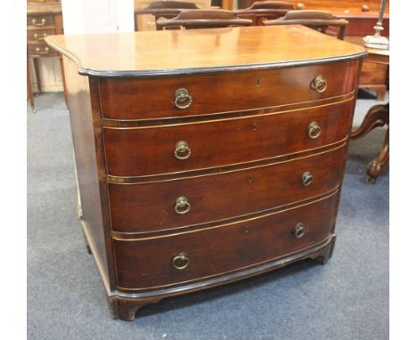 A 19th century mahogany and inlaid bowfront chest of four graduated drawers, with cast brass ring handles (one repaired), on 