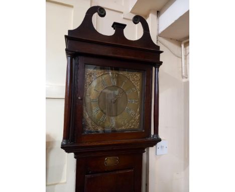 A George III oak longcase clock with eleven inch square brass dial marked Chas Vaughan Pont Pool, 205cm