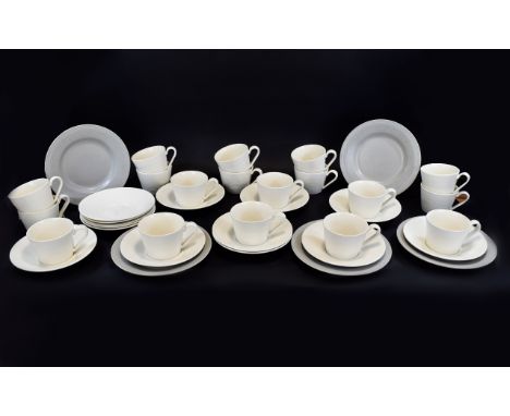 Wedgwood Paul Costello Design Tea Service comprises 18 tea cups, 14 tea saucers, 5 plates. 37 pieces in total.