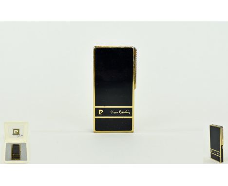 Pierce Cardin Black and Gold Slim line Lighter. 3 Inches High. Good Overall Condition. 