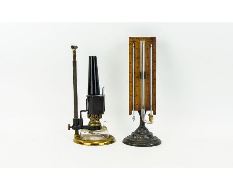 Antique Scientific Instruments Two in total, the first appearing to be a Bunsen burner with brass base, marked 'W. Watson & S