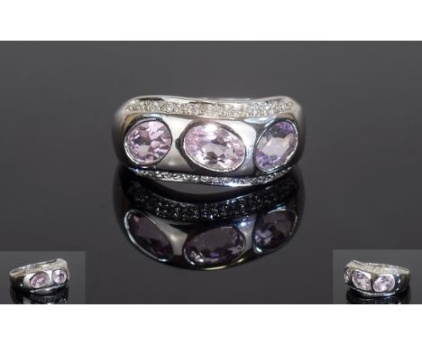 14ct White Gold Dress Ring, Set With Three Oval Amethysts Between Two Rows Of Round Cut Diamonds, Stamped 14k 585, Ring Size 