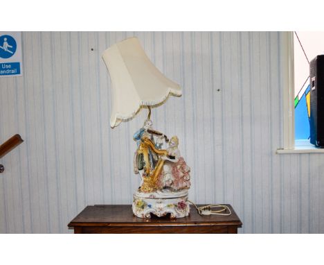 Large Figurative Ceramic Table Lamp Italian style lamp depicting figures in fashionable dress of the 1780's, the female figur