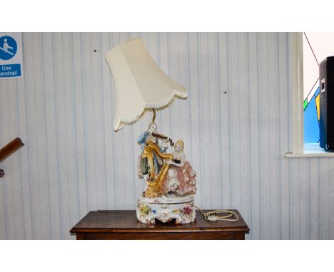 Large Figurative Ceramic Table Lamp Italian style lamp depicting figures in fashionable dress of the 1780's, the female figur