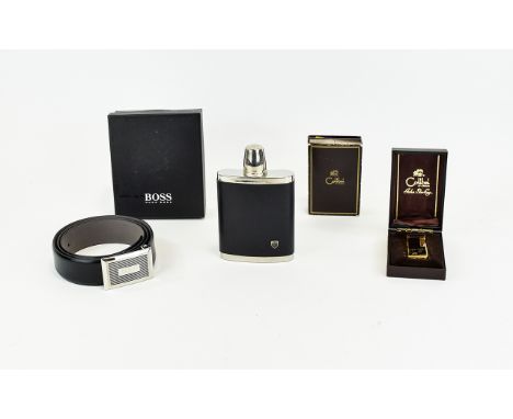 A Boxed Brand New Hugo Boss Belt Along with A Vintage Colibri Lighter And Stainless Steel Hip Flask Three items in total, a g