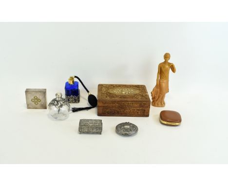 A Small Collection Of Perfume Bottles And Trinket Boxes Eight items in total to include, blue glass decorative bottle with bl