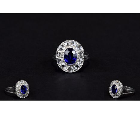 Ladies 18ct White Gold Diamond Cluster Ring Set With A Central Blue Sapphire Surrounded By Eleven Old Round European Cut Diam