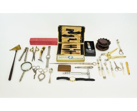 A Collection Of Small Metal Items To include boxed corkscrew, tin of pencils, bookmark, police whistle, magnifying glass, can