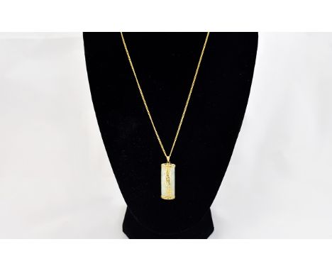 A 9ct Gold Mounted Jade Pendant with Attached 9ct Gold Long Chain, The Jade Overlaid In Gold Chinese Character Marks. All Ful