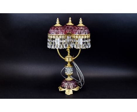 Decorative Three Shade Glass And Crystal Table Lamp Brass toned lamp in high Victorian revival style with three arms and pale