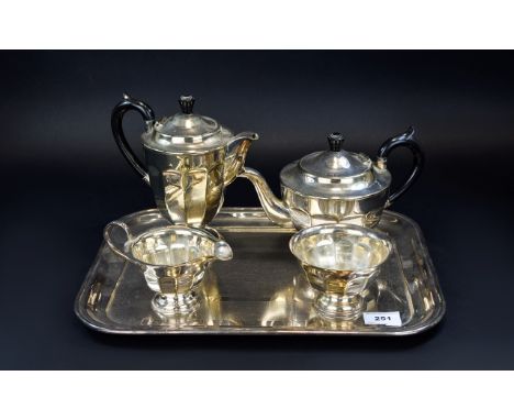 Sheffield Steel Tea And Coffee Service Early 20th century stainless steel serve ware to include tray, coffee pot, tea pot, cr