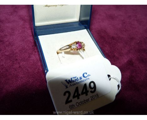 An 18ct vintage three stone ruby diamond Ring