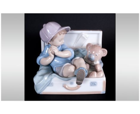 Lladro Figure 'My Favourite Place' boy & teddy in suitcase. Model number 67958, sculpture Joan Herrro, 5x6'' Mint condition.