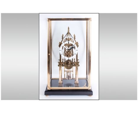 A Vintage and Impressive Quality Brass Cathedral Shaped Skeleton Clock with fusee movement. Circa 1950's. Housed in a brass a