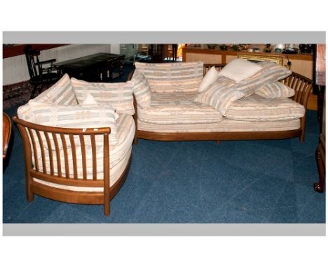 Ercol Large Three Seater Windsor Type Settee, with slatted back arms, shaped at the sides with matching armchair in a light o