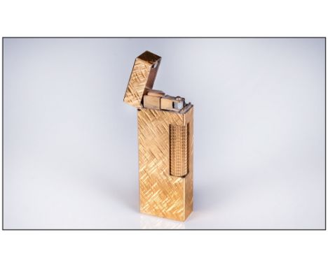 Dunhill Quality 1960's Gold Plated Lighter. 2.5 inches by 1 inch. Excellent condition.