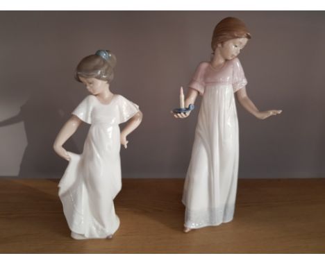 TWO NAO FIGURES GIRL WITH CANDLE AND ANOTHER HOLDING HER DRESS IN ORIGINAL BOXES