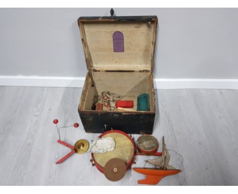 A LEATHER BOUND WOODEN TRUNK BY T W SHEERMAN 73 NORTH STREET BRIGHTON TOGETHER WITH A SMALL QUANTITY OF CHILDRENS TOYS