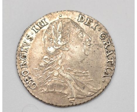 A late 18th century King George III .925 silver shilling having the bust of George III facing right with the inscription read