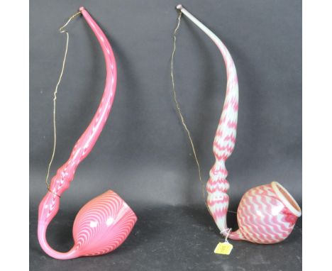 Two Victorian 19th century Nailsea ornamental glass pipe with alternated white &amp; candy pink striped decoration . Largest 
