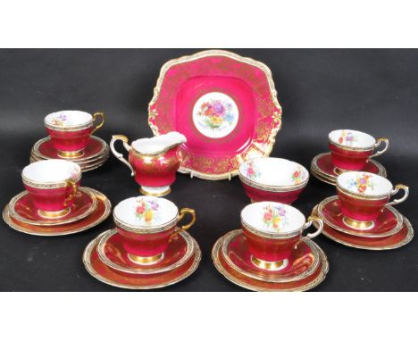 A vintage 20th century circa. 1940's Paragon fine bone china tea service tea service comprising of six teacups, saucers, side