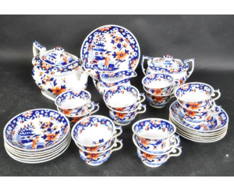 A 19th century William IV china tea set having comprising of twelve cups and saucers, creamer jug, dish and more. The service