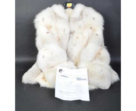 A vintage 1980's white arctic fox fur coat / jacket. The jacket having vertical pelts to body and horizonal pelts along the s