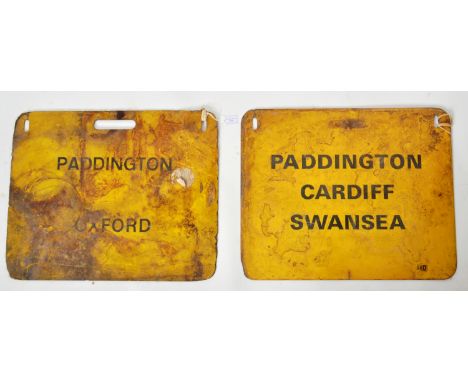 A pair of vintage British Rail coach destination panels. The first double sided panel reads: PADDINGTON / FISHGUARD and PADDI