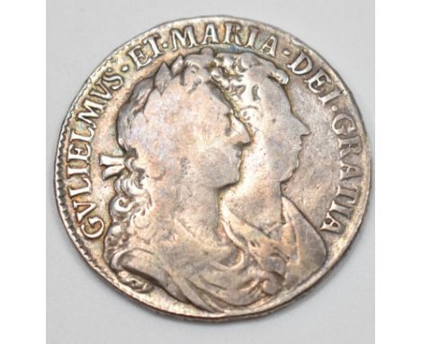 A late 17th century King William III & Mary II .925 silver half crown with the observe having the conjoined first busts of Wi