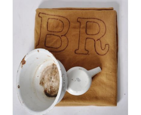 A collection of British Railway onboard Memorabilia, to include: a mid-century water / wash jug, stamped on the base with the