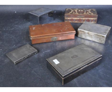 An assortment of early 20th century and later boxes to include two silver plated cigarette boxes with engine turned decoratio