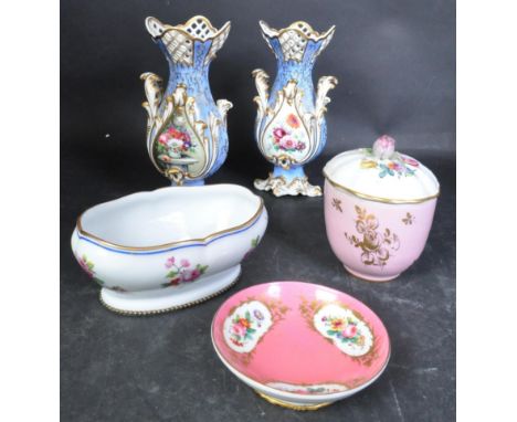 A pair of 19th century Victorian era porcelain Granger Worcester twin vases. The vases having lattice pierced rims over pale 