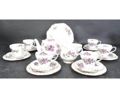 A vintage 20th century Duchess bone china tea service in the Violetta pattern. The set comprising of teacups, saucers, side p